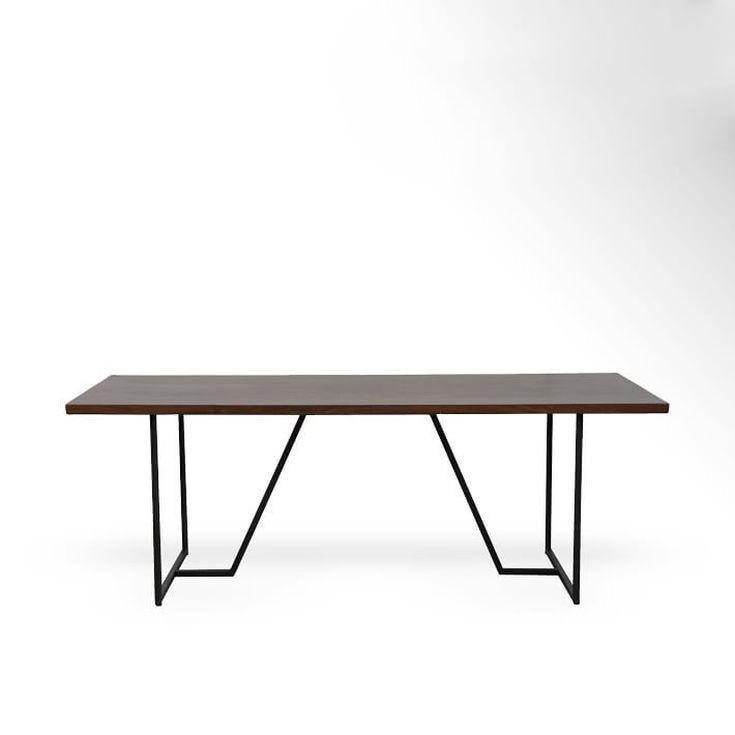 Column Desk with a dark wood top and angular black legs
