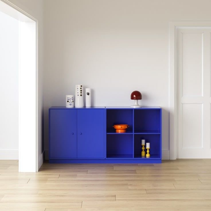 Cubby Low Cabinet styled in a living room