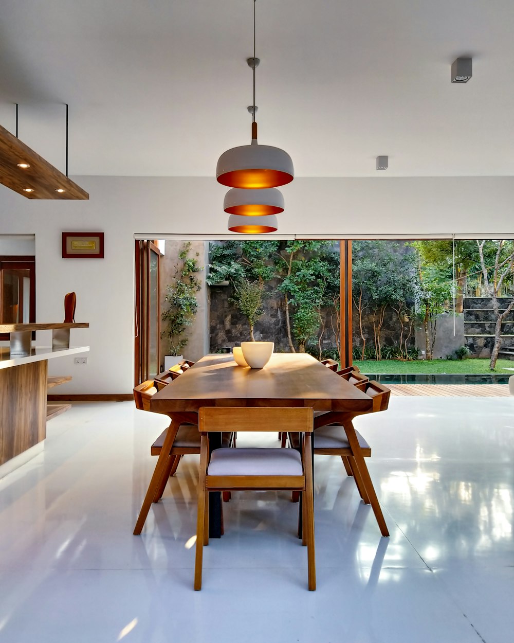 Girder Dining Table — brown wooden table and chairs