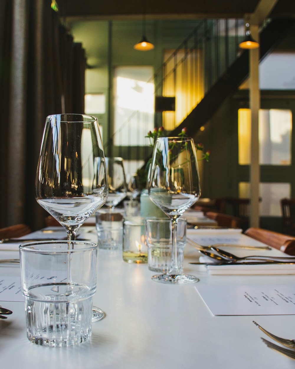 Keel Dining Table — glassware on a dining table