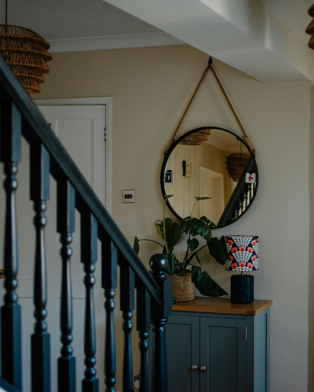 Reveal Console — a hallway with a mirror and cabinet