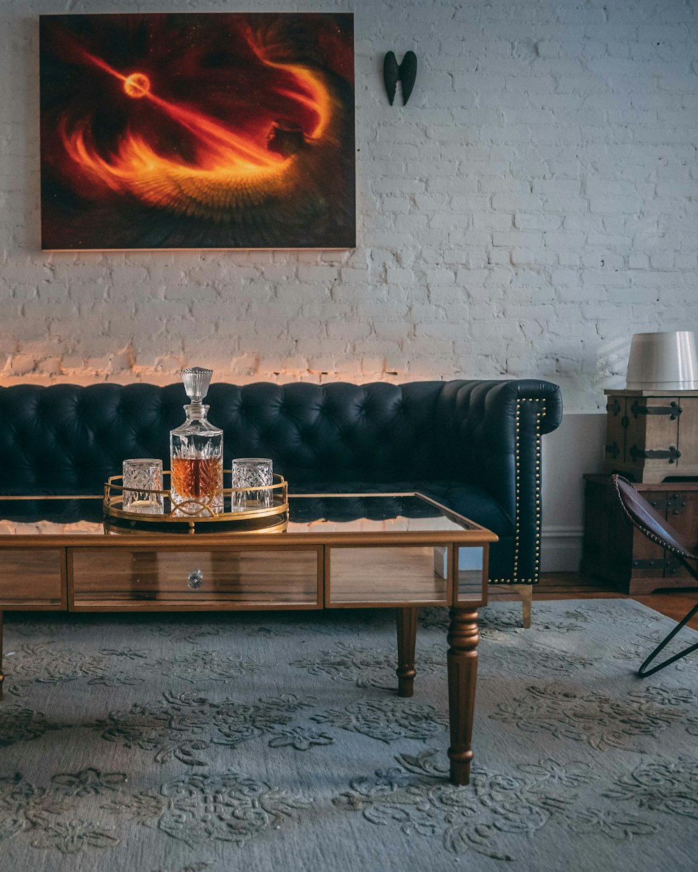 Stub Side Table — a decanter on a low table