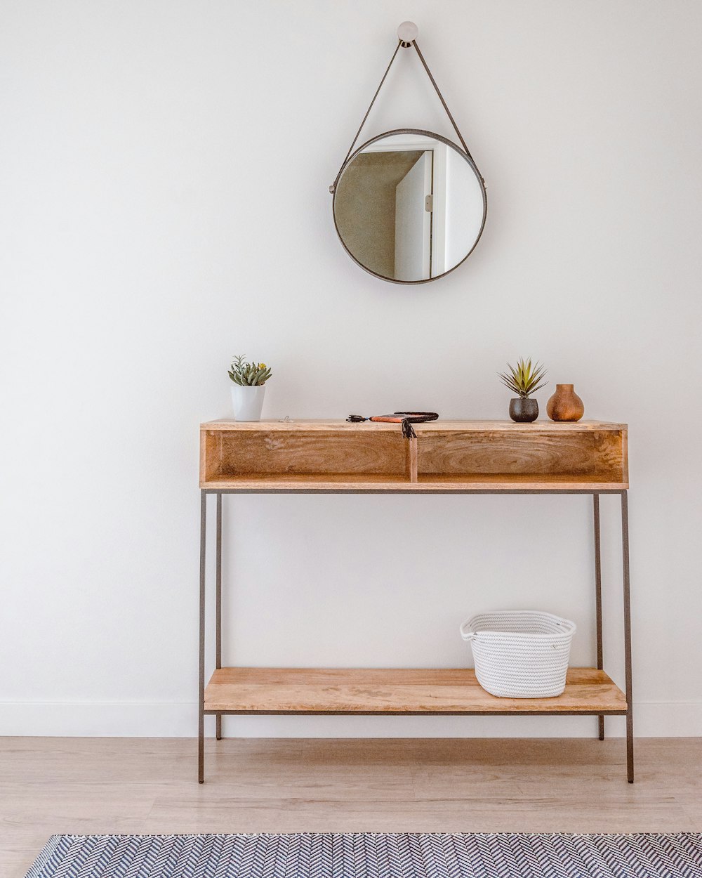 Threshold Console — a mirror above a console shelf